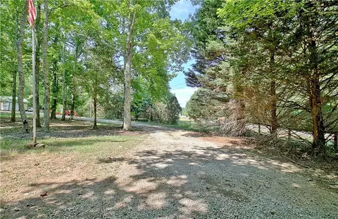 Exterior - 303 Rocky Creek Rd, Hampton, GA 30228 photo 4 of 31