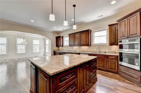Kitchen - 7890 Royal Melbourne Way, Duluth, GA 30097 photo 8 of 9