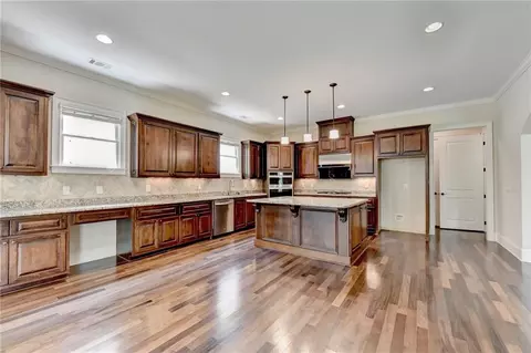 Kitchen - 7890 Royal Melbourne Way, Duluth, GA 30097 photo 9 of 9