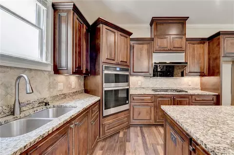 Kitchen - 7890 Royal Melbourne Way, Duluth, GA 30097 photo 6 of 9