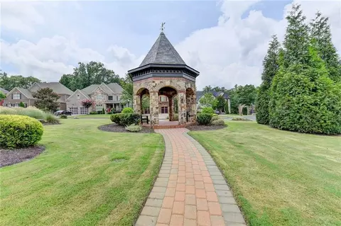 Exterior - 7890 Royal Melbourne Way, Duluth, GA 30097 photo 2 of 11
