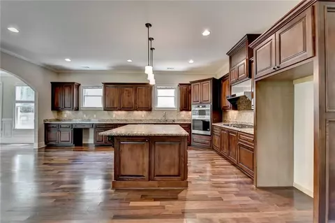 Kitchen - 7890 Royal Melbourne Way, Duluth, GA 30097 photo 1 of 9