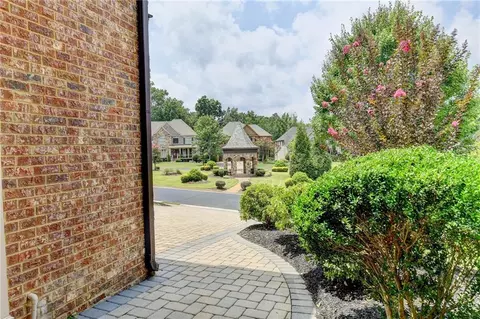 Exterior - 7890 Royal Melbourne Way, Duluth, GA 30097 photo 4 of 11