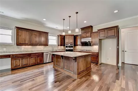 Kitchen - 7890 Royal Melbourne Way, Duluth, GA 30097 photo 2 of 9