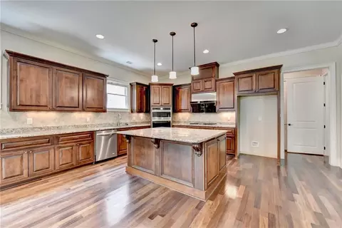 Kitchen - 7890 Royal Melbourne Way, Duluth, GA 30097 photo 3 of 9
