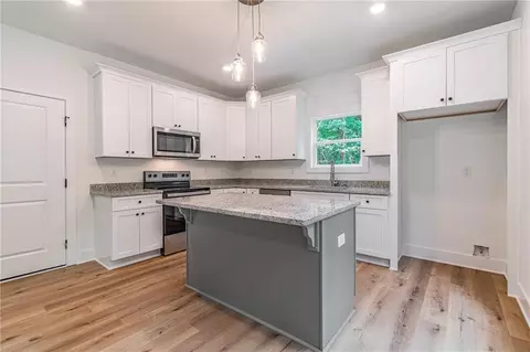 Kitchen - 7616 Maple Pl, Murrayville, GA 30564 photo 1 of 3