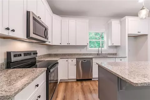 Kitchen - 7616 Maple Pl, Murrayville, GA 30564 photo 3 of 3