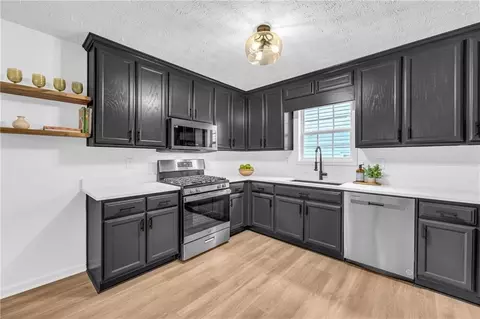 Kitchen - 260 Lassiter Dr, Covington, GA 30016 photo 2 of 2