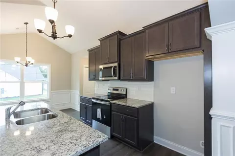 Kitchen - 130 Eryn Ter, Covington, GA 30014 photo 2 of 2