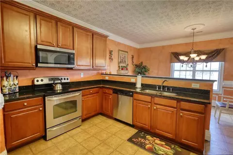 Kitchen - 85 Tanglewood Dr, Covington, GA 30016 photo 1 of 2