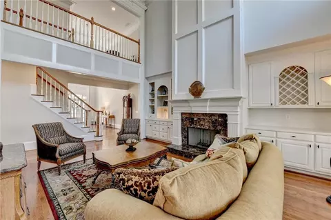 Living - 6950 Kettering Ln, Suwanee, GA 30024 photo 3 of 7
