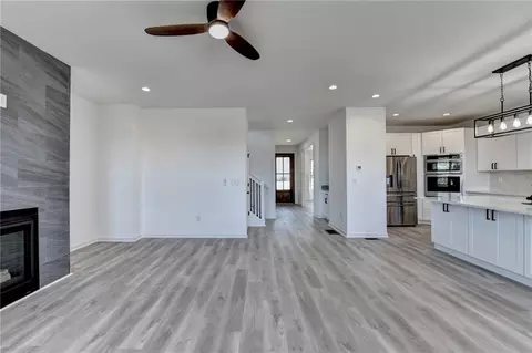 Living - 5945 Springbox Dr, Suwanee, GA 30024 photo 6 of 9