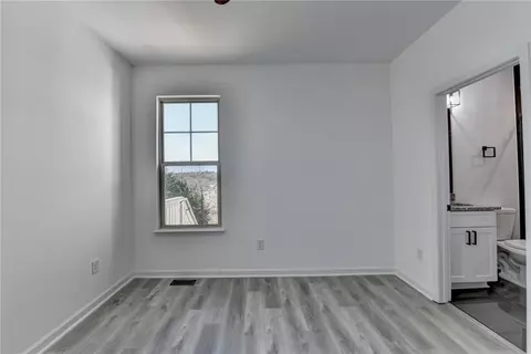 Bedroom - 5945 Springbox Dr, Suwanee, GA 30024 photo 2 of 11