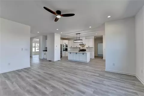 Living - 5945 Springbox Dr, Suwanee, GA 30024 photo 7 of 9
