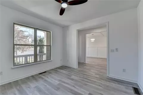 Living - 5945 Springbox Dr, Suwanee, GA 30024 photo 2 of 9