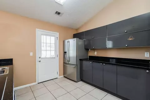 Kitchen - 10670 Day Lily Dr, Hampton, GA 30228 photo 2 of 2