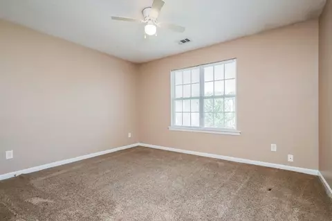 Bedroom - 10670 Day Lily Dr, Hampton, GA 30228 photo 3 of 5