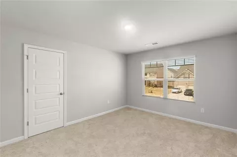 Bedroom - 265 Lakeridge Ct, Covington, GA 30016 photo 8 of 10