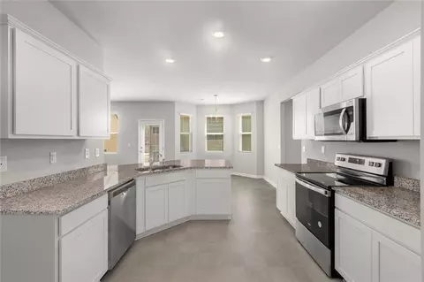 Kitchen - 265 Lakeridge Ct, Covington, GA 30016 photo 2 of 3