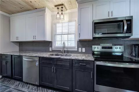 Kitchen - 300 Mini Rd SE, Rydal, GA 30171 photo 2 of 5