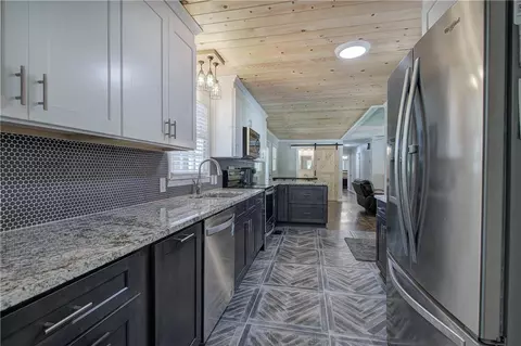 Kitchen - 300 Mini Rd SE, Rydal, GA 30171 photo 3 of 5