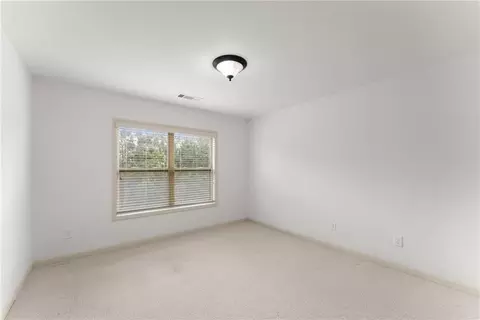 Bedroom - 550 Eldridge Dr, Suwanee, GA 30024 photo 12 of 15