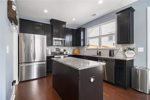 Kitchen - 7676 Viking Rd, Fairburn, GA 30213 photo 2 of 2