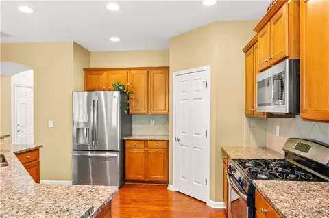 Kitchen - 450 Hammersmith Dr, Suwanee, GA 30024 photo 2 of 2