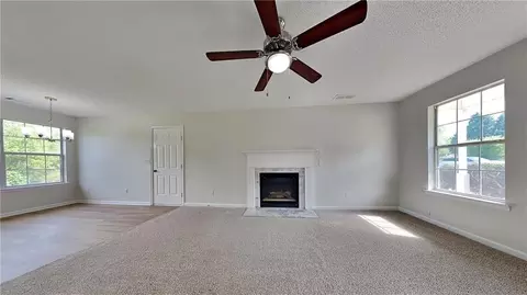 Living - 64 Dogwood Rdg, Hampton, GA 30228 photo 2 of 4