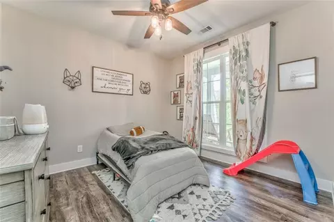 Bedroom - 555 E Valley Rd NE, Rydal, GA 30171 photo 9 of 11