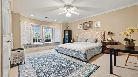 Bedroom - 5560 Stoneleigh Dr, Suwanee, GA 30024 photo 9 of 10