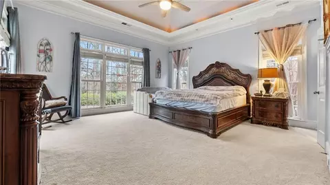 Bedroom - 5560 Stoneleigh Dr, Suwanee, GA 30024 photo 5 of 10