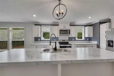 Kitchen - 359 Hembree Rd, Commerce, GA 30529 photo 4 of 5