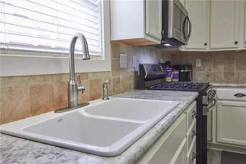 Kitchen - 230 Ryan Ln, Covington, GA 30014 photo 2 of 4