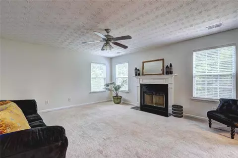 Living - 347 Cobblestone Ct, Hampton, GA 30228 photo 7 of 7