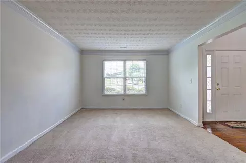 Living - 347 Cobblestone Ct, Hampton, GA 30228 photo 2 of 7