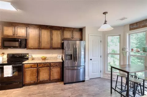 Kitchen - 340 Thoroughbred Trl, Monroe, GA 30655 photo 2 of 4