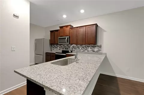 Kitchen - 10814 Wheeler Trce, Hampton, GA 30228 photo 2 of 2