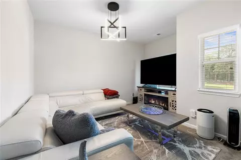 Living - 140 Canyons Ct, Hampton, GA 30228 photo 1 of 1