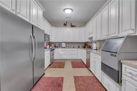 Kitchen - 14501 Woolsey Rd, Hampton, GA 30228 photo 7 of 10