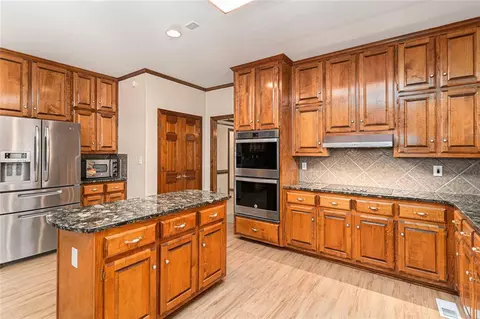 Kitchen - 402 Clyde Ct, Mcdonough, GA 30252 photo 2 of 5
