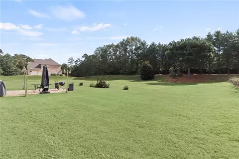 Exterior - 50 Cannonade Ct, Covington, GA 30016 photo 9 of 11
