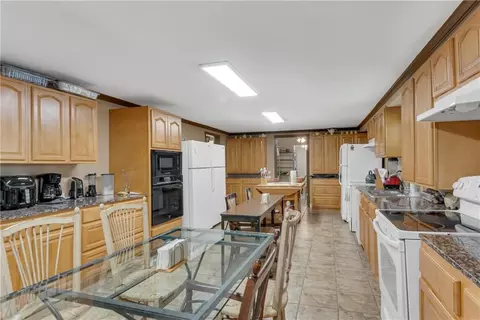 Kitchen - 8024 E Cherokee Dr, Canton, GA 30115 photo 2 of 3