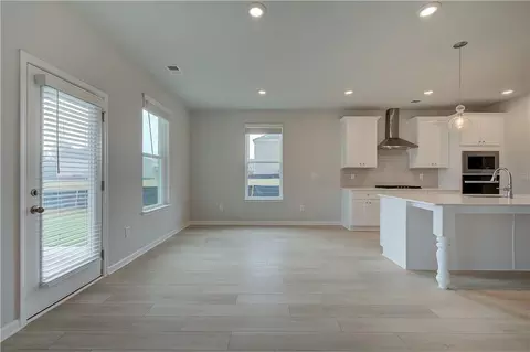 Living - 428 Hatcher Ct, Hampton, GA 30228 photo 5 of 8