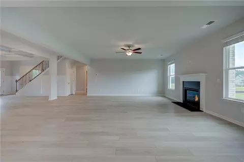 Living - 428 Hatcher Ct, Hampton, GA 30228 photo 7 of 8