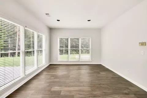 Living - 6625 Eagle Pt, Suwanee, GA 30024 photo 6 of 7