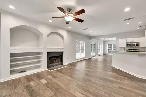 Living - 6625 Eagle Pt, Suwanee, GA 30024 photo 5 of 7