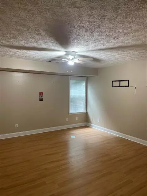 Living - 101 Bridgemill Dr, Hampton, GA 30228 photo 6 of 7