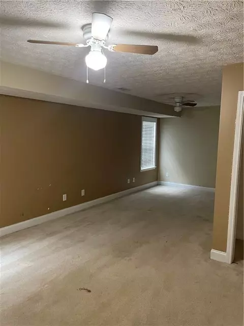 Living - 101 Bridgemill Dr, Hampton, GA 30228 photo 7 of 7