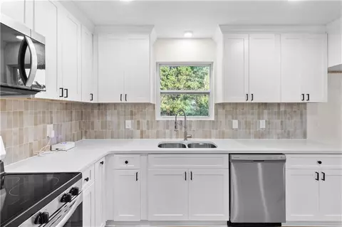 Kitchen - 417 Phillips Dr NW, Monroe, GA 30656 photo 1 of 2